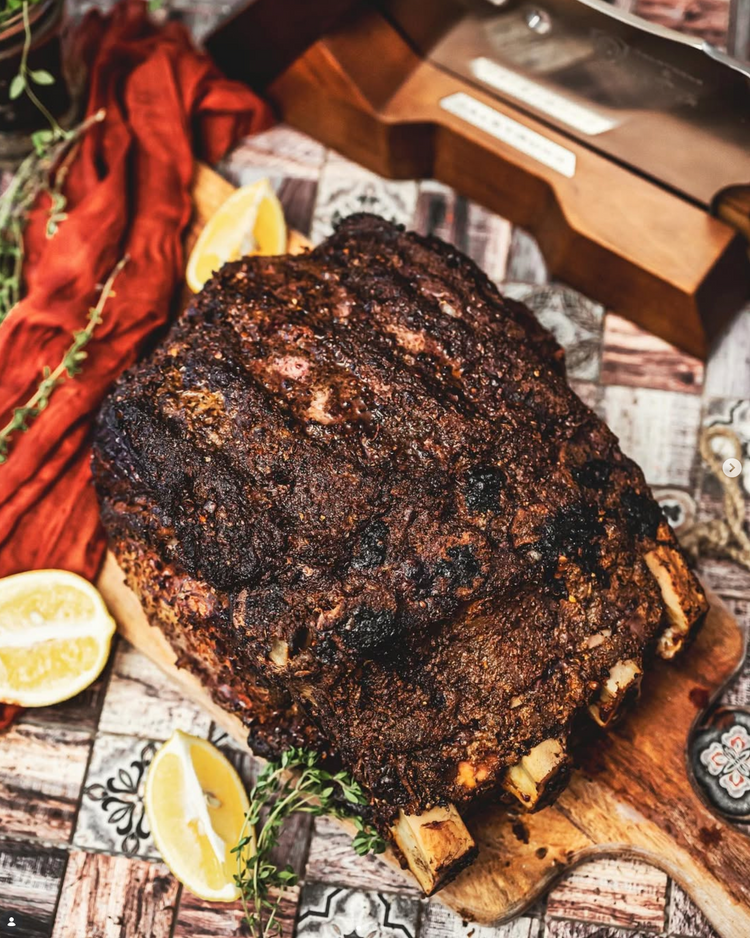 Smoked brisket sandwich with pickles and coleslaw, seasoned for bold grilling and BBQ flavors